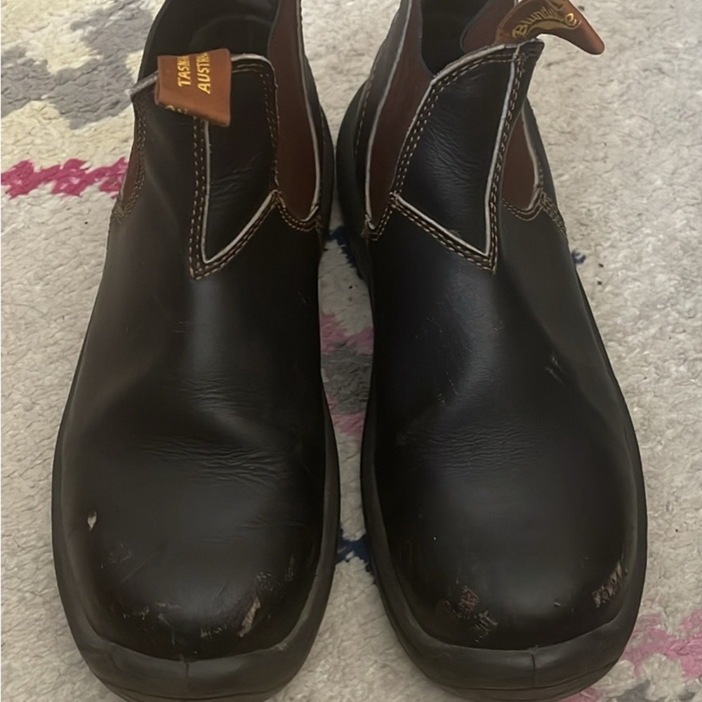 Men’s size 10 Bludstone leather boots with steel toe. See photo for minor wear